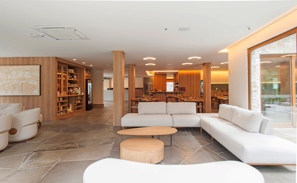 Sala com sofá Attua Design